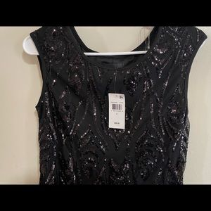 completely new black dress I bought it at macys in the wrong size